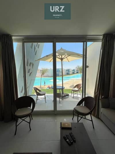 Two-bedroom chalet first row on Crystal Lagoon for sale in Ras El Hekma North Coast next to modon near Mountain View cali coast dose  La Vista
