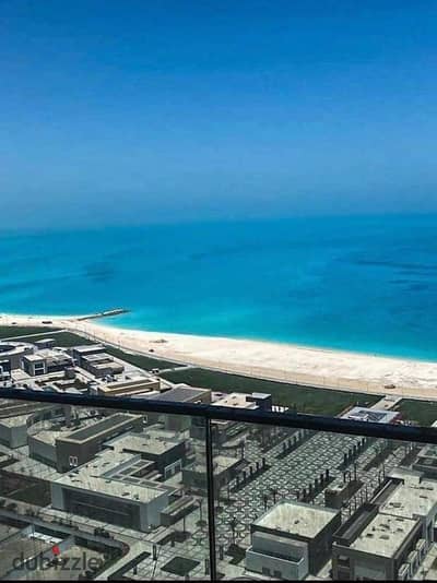 Receive a fully finished, ready-to-move-in apartment with a double sea and lagoon view in Mazarine, New Alamein, next to Alamein Towers.