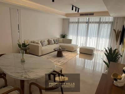 Receive immediately a 115-meter panoramic apartment with a garden, fully finished and air-conditioned, from MARASEM, next to Mivida and AUC, New Cairo Receive immediately a 115-meter panoramic apartment with a garden, fully finished and air-conditioned, from MARASEM, next to Mivida and AUC, New Cairo