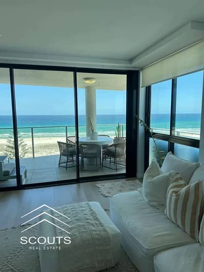 A fully finished hotel apartment with air conditioning, immediate delivery in Alamein Towers, on a wonderful and amazing beachfront location in the he