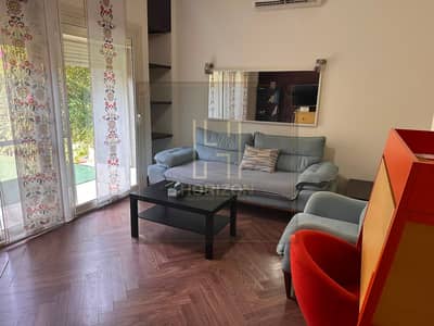 Furnished Studio with garden for rent in The Village New Cairo
