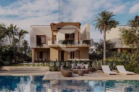 town house  for sale, in ramla ras elhikma north coast , fully finished with AC and kitchen , direct lagoon  5 minets from beach