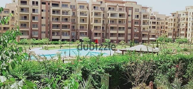 Apartment for sale in Garden Hills Compound 6th of October 200 square meters. The apartment overlooks a large lake and landscaped area. The apartment consists of 3 rooms, 3 bathrooms, and 2 terraces with an open view. The price is 3 million and 450 thousand.