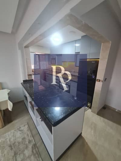 شقة أرضي بحري بمطبخ بجاردن في جاردينيا سيتي | تشطيب Ultra Super Lux | Open View.