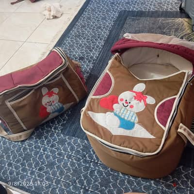 حمالة بيبي مع حقيبة بيبي