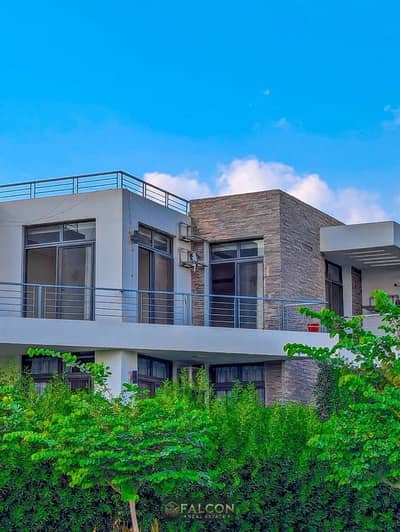 Apartment for sale with a rooftop terrace bahari and a prime location opposite the Kempinski Hotel in Taj City in Installment