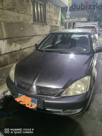 ميتسوبيشي لانسر بومه 2010 حاله ممتازه فبريكا بالكامل Mitsubishi Lancer