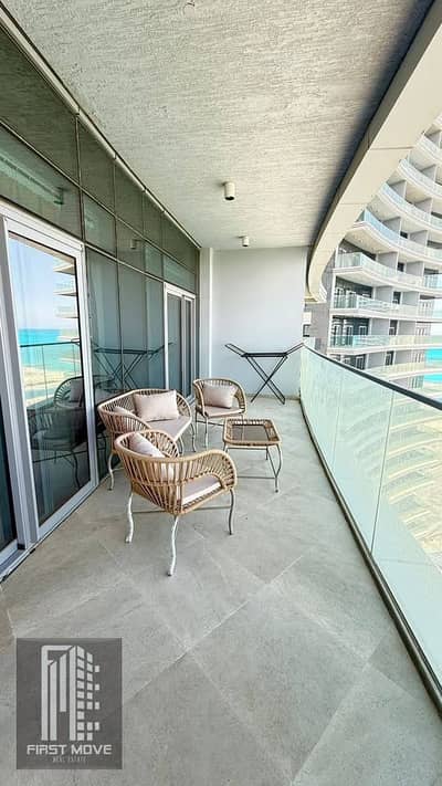 Double View Apartment in Alamein Towers on the North Coast by the sea and lagoon, prime location, immediate delivery, fully finished, multiple payment systems with discount on cash and installment options.