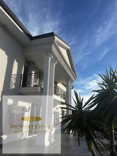 Ready-to-move-in villa with a distinctive double view for sale in New Cairo at the lowest price on the market.
