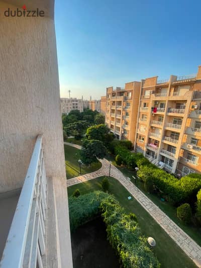 An excellent rental opportunity in Madinaty: an 82-square-meter apartment in Phase B7, featuring a view of the "Narrow Garden. "