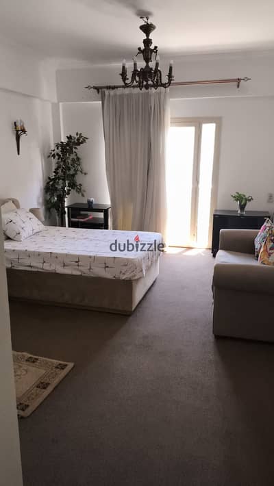 Furnished studio with air conditioning and a roof in the Yasmeen Compound, Sheikh Zayed