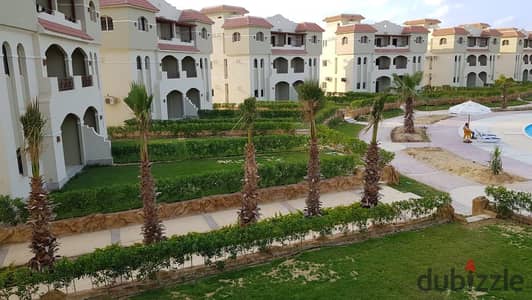 شاليه بجاردن للبيع في لاسرسينا الساحل الشمالي - بتشطيب كامل بفيو مباشر علي البحر بالقرب من هاسيندا