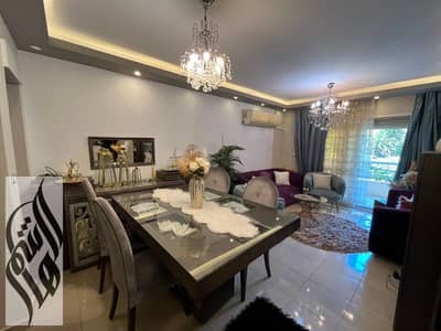 103 sqm ground-floor apartment in Madinaty B6 with a 45 sqm private garden, 3 bedrooms, 2 bathrooms, special finishing and kitchen cabinets included.