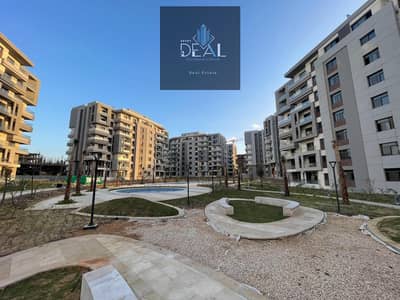  Your ready-to-move apartment in a fully inhabited residential compound with an 18% discount, located directly opposite Celia by Talaat Moustafa and