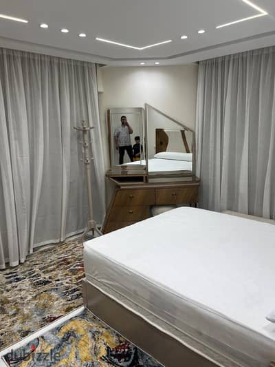 Furnished apartment for rent with three rooms and three bathrooms in Bavaria Town compound on Maadi Ring Road directly on the tenth floor, hotel furnishings. The location of the compound is extremely special, a quarter of an hour to the Fifth Settlement, two minutes to Carrefour, and five minutes to Fifty Mall. It is located in the heart of Zahraa Al-Maadi and Wadi Degla Club, and also close to universities.
