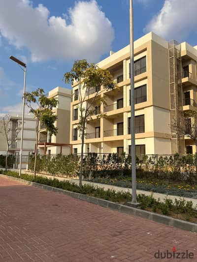 Ground floor apartment with garden for sale at a bargain price, with air conditioning and kitchen in Al Marasem