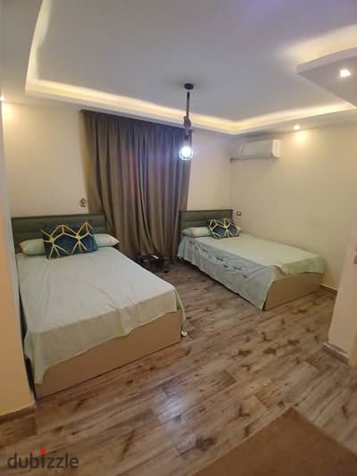 Furnished apartment with a garden for rent – ​​fully air-conditioned – fully furnished with modern IKEA furniture – 2 bedrooms, 2 bathrooms – located