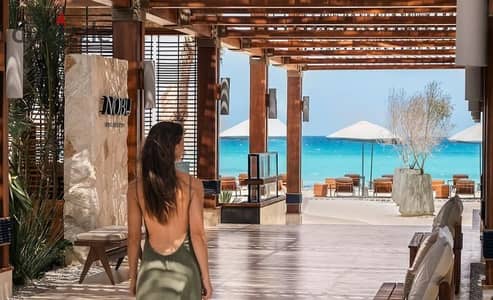Furnished Hotel Suite in NOBU Hotel Full Sea View Only Steps From The Beach in Ogami Sodic Ras El Hekma North Coast