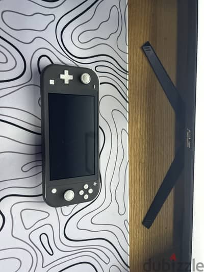 Nintendo switch lite gray 32gb + 64gb sd card and original charger