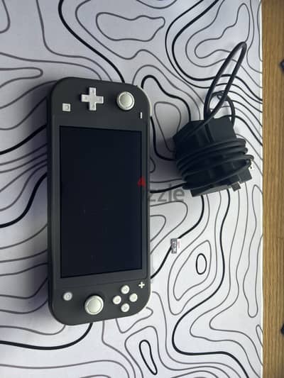 Nintendo switch lite gray 32gb + 64gb sd card and original charger