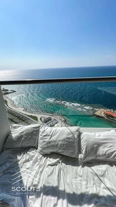 A stunning beachfront chalet for sale two fully finished bedrooms & AC'S panoramic sea views first row at sea investment returns near marina , mazarin
