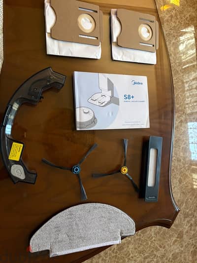Midea C8+ vacuum with self-cleaning base