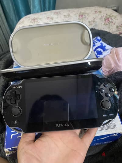Ps vita (PlayStation vita) sony with box, games and cover