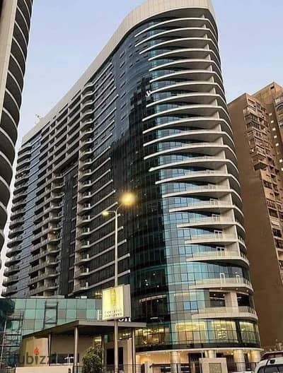 A fully furnished and equipped hotel apartment with a glass facade overlooking the Nile Corniche, in a strategic location next to the Hilton Maadi Hot