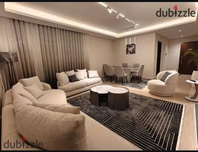Furnished apartment, first residence, hotel-style, modern building, 2025, for monthly rent, Nasr City, between Abbas and Makram, close to all services, malls, cafes, restaurants, and hospitals, tourist location, 3 rooms, 2 bathrooms, spacious reception, fully air-conditioned, high-speed Wi-Fi, private intercom for the apartment, chic building