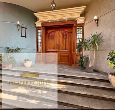 Villa with private pool for sale with a landscape view in New Cairo