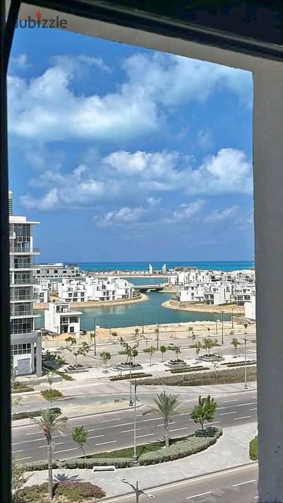 للبيع شاليه تشطيب كامل في الساحل الشمالي | North Coast  امام ابراج العلمين استلام فوري في مزارين دايركت على البحر