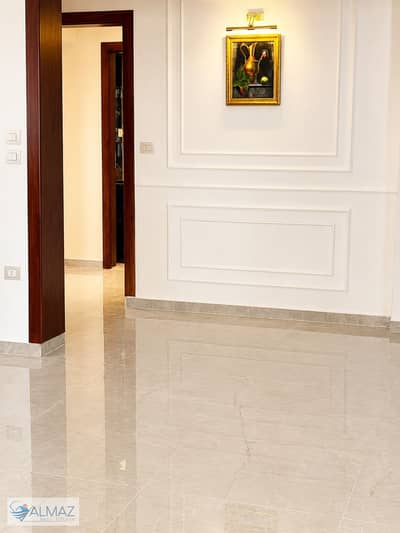 Unfurnished 190 sqm apartment for rent in Palm Hills New Cairo Compound, Fifth Settlement, with kitchen, air conditioning, and water heaters.