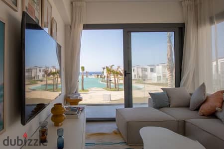 Fully finished chalet  with lagoon view  for sale in Cali Coast, Ras El Hekma at kilo  193 before direction white