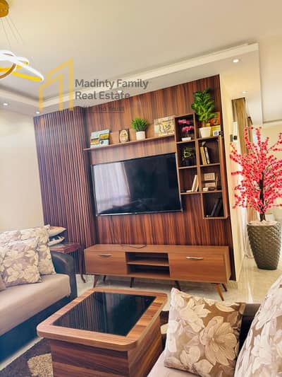 For rent, a furnished apartment of 211 square meters, super lux in Madinaty, close to the club and services, distinguished furnishing