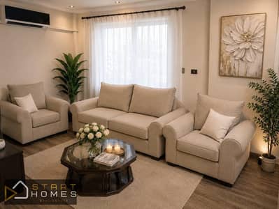 A fully furnished, 143-square-meter, two-bedroom apartment is available for rent in the upscale Madinaty B6 district. It features distinctive furnishi