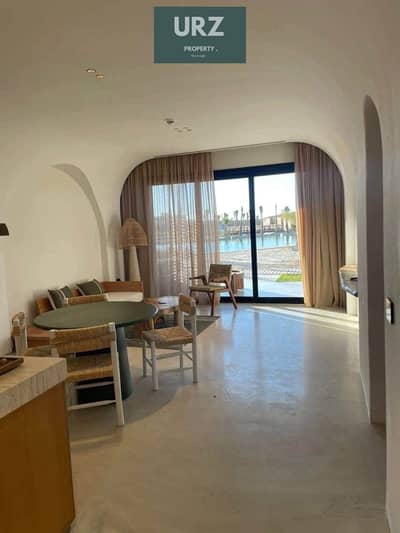 9 سنين تقسيط استثمر او اسكن في شالية صف اول علي Lagoon و  fully finished + ACs موقع بانورامي من سعر للبيع في الساحل الشمالي بالقرب مدن راس الحكمة