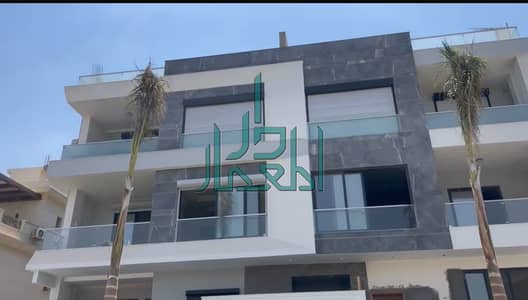 Semi-finished apartment for sale, 300 sqm and private garden 171 sqm, lower ground floor, West Golf Extension, Fifth Settlement, New Cairo