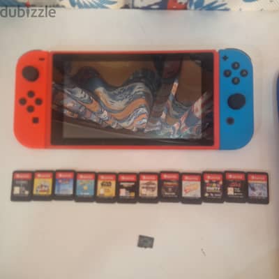 Nintendo switch with 12 games and 128 gbs micro sd with the bag