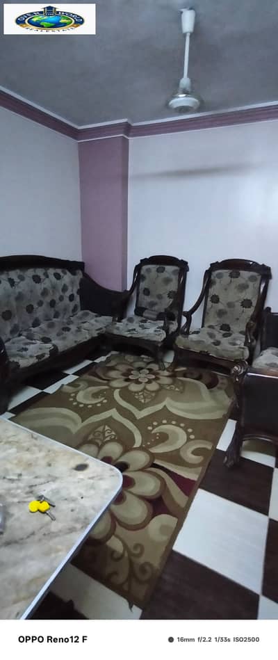 For rent, a furnished apartment in Maadi consisting of two bedrooms, a reception, a bathroom, and a kitchen on the seventh floor with an elevator.