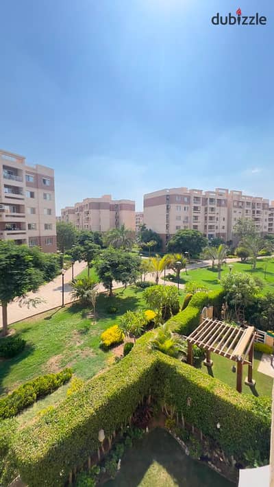 For sale in Madinaty, a 160m² apartment with a wide garden view, excellent location, at a competitive price, steps from services.