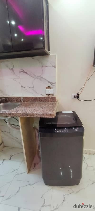 Furnished studio for rent in October, 2nd district, steps to the parking lot, Al-Hosari, and the university
