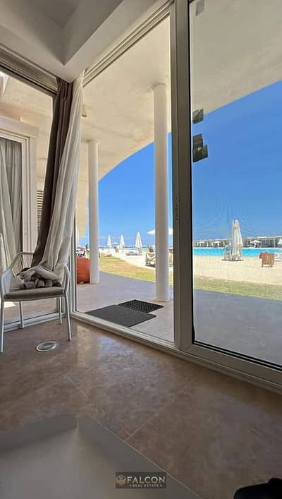 Duplex chalet with garden view, directly on the sea, minutes from amenities, for sale in Cali Coast, Ras El Hekma - North Coast, area 185 meters - Cal