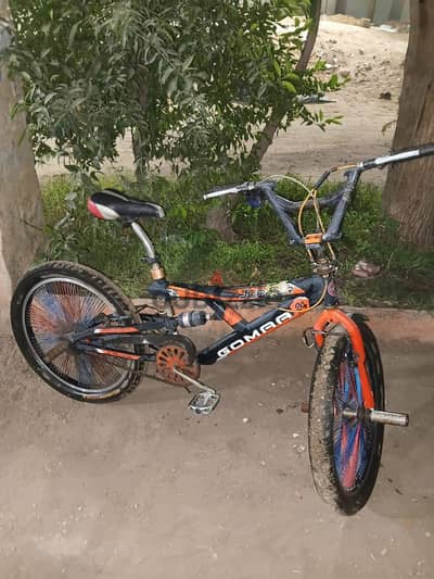دراجه Bmx ماركة (جوما) مقاس 24 باللونين الأسود و البرتقالي