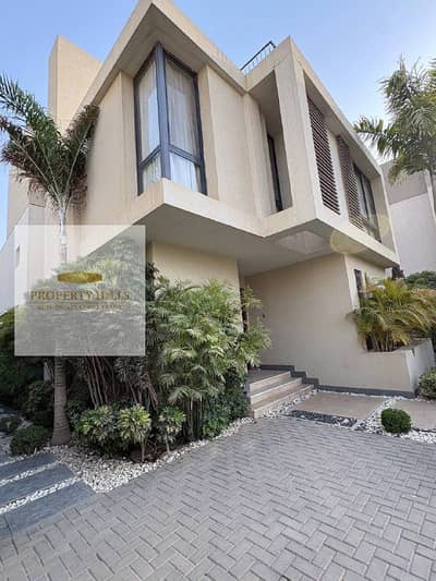 Villa for sale with full finishing in Al Shorouk with a large private garden in Sodic East compound minutes from Cairo Airport