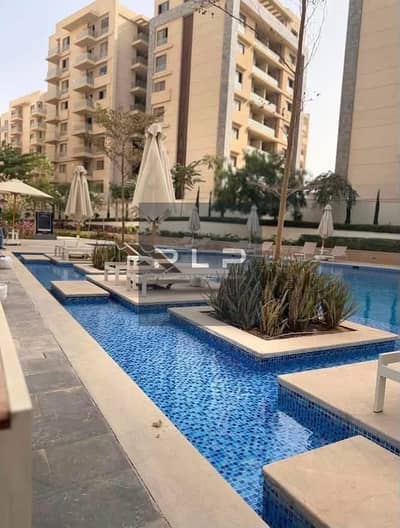 cheapest resale apartment with garden (ready to move) with the lowest price for quick sale in Il Bosco compound Misr Italia in New Capital