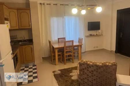 Furnished rooftop studio apartment for rent in Acacia Compound, First Settlement, directly opposite Gate 6 of Rehab City