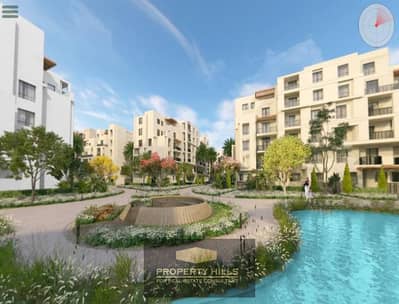 Two-bedroom apartment fully finished, immediate delivery in O-West compound, Orascom Company, directly on the Wahat Road, minutes from Mall of Egypt