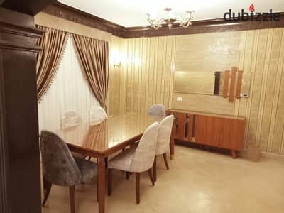 Furnished apartment for rent in Al-Obour Buildings, Salah Salem, Heliopolis, with a wonderful view of the Republican Guard and a waterfront.