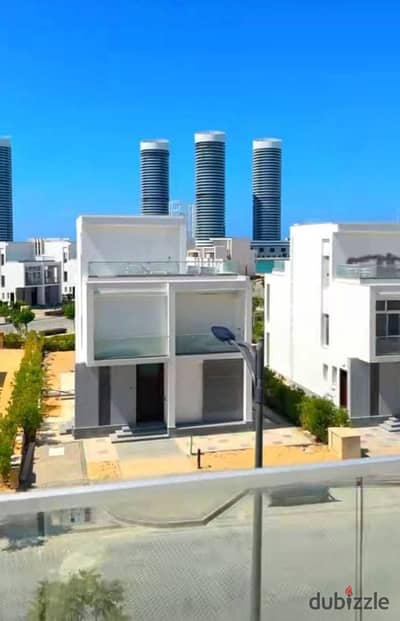 تاون هاوس فيو ابراج العلمين  استلام فورى - جاهز للسكن Fully Finished بالكامل برايم لوكيشن فى مزارين العالمين الجديده الساحل الشمالى Mazarin