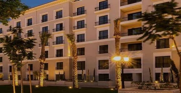 Apartment for rent in the Village West compound - Sheikh Zayed, area 123 square meters, kitchen, and air conditioners, second floor